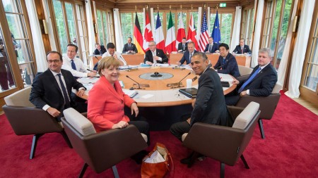 (R-L, clockwise), US President Barack Obama, German Chancellor Angela Merkel, French President Francois Hollande, British Prime Minister David Cameron, Italian Prime Minister Matteo Renzi, European Commission President Jean-Claude Juncker, EU Council President Donald Tusk, Japan's Prime Minister Shinzo Abe and Prime Minister of Canada Stephen Harper, sitting together at Elmau Castle in Elmau, Germany, 08 June 2015, at the third session of their G7 meeting. Photo by: Michael Kappeler/picture-alliance/dpa/AP Images