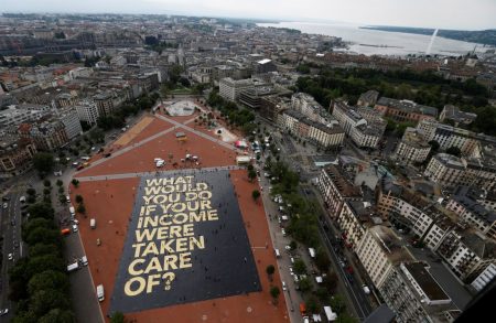 A 8,000 square meter poster is pictured on the Plainpalais square in Geneva, Switzerland May 14, 2016. The committee for the initiative for an