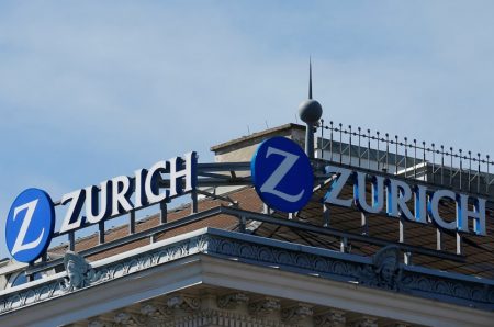 The logo of Zurich insurance company is seen on the roof of an office building in Vienna