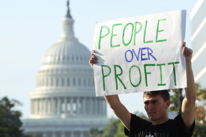 Environmental Activists Hold Protest Shutting Down Roads In Nation's Capital